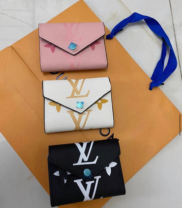 Louis Vuitton Leather Wallets