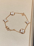 STAR AND SUN 5 MOTIF MOP PINK GOLD BRACELET