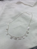 STAR AND SUN MULTI CHARM SILVER NECKLACE