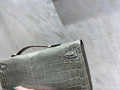 KELLY CUT 31 IN ASH GRAY SHINNY ALLIGATOR LEATHER WITH SILVER HARDWARE