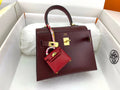 KELLY MINI 20 BAG IN WINE RED SMOOTH CALFSKIN WITH GOLD HARDWARE