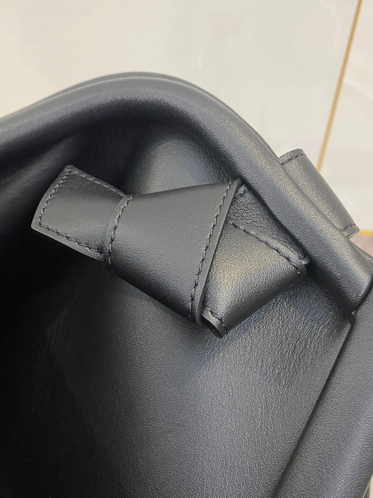 TRIANGLE HANDLE BAG 31 IN BLACK LAMBSKIN