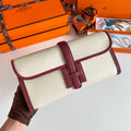 JIGE ELAN 29 CLUTCH IN WHITE CALFSKIN WITH GARNET RED LIZARD SKIN