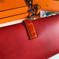 JIGE ELAN 29 CLUTCH IN RUBY RED CALFSKIN WITH APPLE RED LIZARD SKIN
