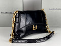 DOWNTOWN SHOULDER BAG 29 IN BLACK WAXED SHEEPSKIN GOLD HARDWARE