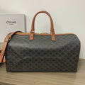 TRAVEL BAG 50 IN BLACK TRIOMPHE CANVAS WITH DOG PRINT