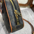 TOP HANDLE BAG 20 IN BLACK TRIOMPHE CANVAS AND BROWN CALFSKIN