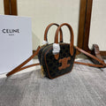 TOP HANDLE BAG 20 IN BLACK TRIOMPHE CANVAS AND BROWN CALFSKIN
