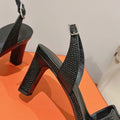 HOLY 75 SANDAL IN BLACK GRAINED CALFSKIN