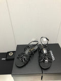 FLORAL FLAT SANDAL IN BLACK LAMBSKIN