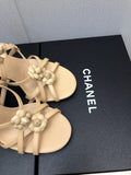 FLORAL HIGH HEEL SANDAL IN SAND YELLOW LAMBSKIN