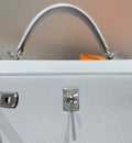 KELLY 25CM IN GRIS PERLE EPSOM CALFSKIN PALLADIUM HARDWARE