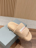 FURRY SLIDES IN BEIGE CURLY SHEARLING
