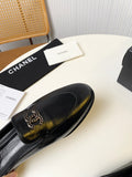 FLAT MULE IN BLACK LAMBSKIN 983818