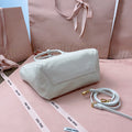 IVY HANDBAG 22 IN WHITE CANVAS