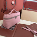 EXTRA POCKET L19 IN FLAMINGO PINK GRAINED CALFSKIN WITH SILVER HARDWARE