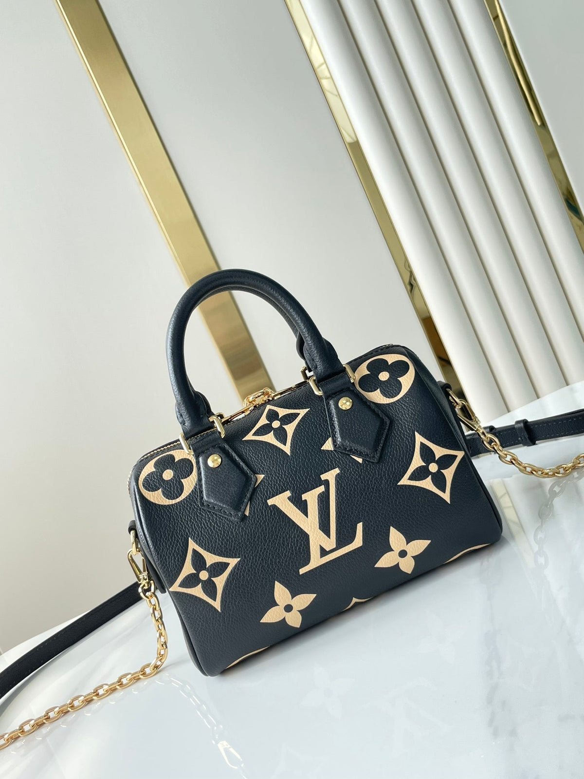 SPEEDY BANDOULIÈRE 20 IN BLACK CREAM MONOGRAM EMPREINTE LEATHER GOLD HARDWARE