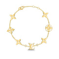STAR AND SUN 7 MOTIFS GOLD BRACELET
