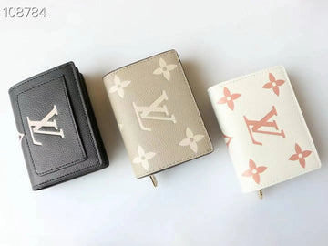 Louis Vuitton Leather Logo Folding Wallet