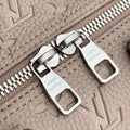 KEEPALL BANDOULIÈRE 34 BAG IN LIGHT BROWN MONOGRAM TAURILLON CALFSKIN