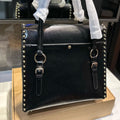 STUDDED TOP HANDLE BAG 33 IN BLACK SMOOTH CALFSKIN