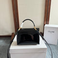 TEEN NINO BAG 20 IN BLACK GLOSSY CALFSKIN GOLD HARDWARE