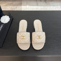 FLAT MULE IN WHITE LAMBSKIN