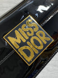 FLAP BAG 18 IN BLACK PATENT CALFSKIN