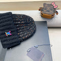 KNITTED BEANIE HAT IN BLACK WOOL 431619