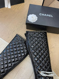 KNEE HIGH BOOTS 8 CM IN BLACK CALFSKIN WITH PEARL CHAIN