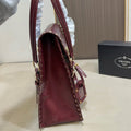 STUDDED TOP HANDLE BAG 33 IN BURGUNDY RED SMOOTH CALFSKIN