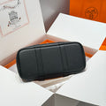 GARDEN PARTY 30CM IN ORANGE MINIMUM TOILETS COTTON CANVAS AND BLACK CALFSKIN