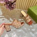 HORSEBIT SLIDE SANDAL IN BRONZE ORANGE MONOGRAM CANVAS AND SHEEPSKIN LINING