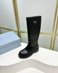 KNEE BOOTS WITH TRIANGLE LOGO IN BLACK CALFSKIN