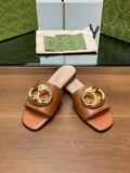FLAT MULE IN BRONE BROWN CALFSKIN WITH GOLD HARDWARE