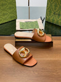 FLAT MULE IN BRONE BROWN CALFSKIN WITH GOLD HARDWARE