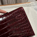 KELLY CUT 31 IN SANGRIA PURPLE ALLIGATOR LEATHER WITH GOLD HARDWARE