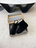 FLAT ANKLE BOOTS IN BLACK SUEDE AND SHEARLING LINING