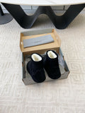 FLAT ANKLE BOOTS IN BLACK SUEDE AND SHEARLING LINING
