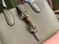 SMALL JACKIE 24 TOTE IN DARK BEIGE LAMBSKIN