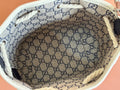 SMALL DRAWSTRING SHOULDER BAG 21 IN WHITE CANVAS DARK BLUE CALFSKIN