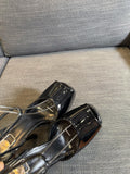 LA SCANDALE PLATFORM SANDALS IN BLACK GLOSSY CALFSKIN