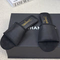 FLAT SLIDE IN BLACK MESH AND SUEDE
