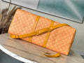 KEEPALL BANDOULIÈRE 55 IN ORANGE MONOGRAM HERITAGE CANVAS