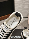 LACE-UP SNEAKERS IN BLACK CANVAS