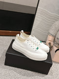 LACE-UP SNEAKERS IN WHITE CANVAS