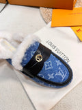 FLAT MULE IN COBALT BLUE MONOGRAM DENIM AND SHEARLING LINING