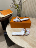 FLAT MULES IN WHITE MONOGRAM LAMBSKIN