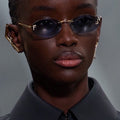 FIRST CRYSTAL RIMLESS OVAL FRAME SUNGLASSES 557152 IN METAL
