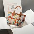 STEEPLE 28 BAG IN COLORFUL CANVAS AND BROWN SWIFT LEATHER